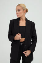 SUNMOR black linen oversized blazer and black linen wide leg trousers for women